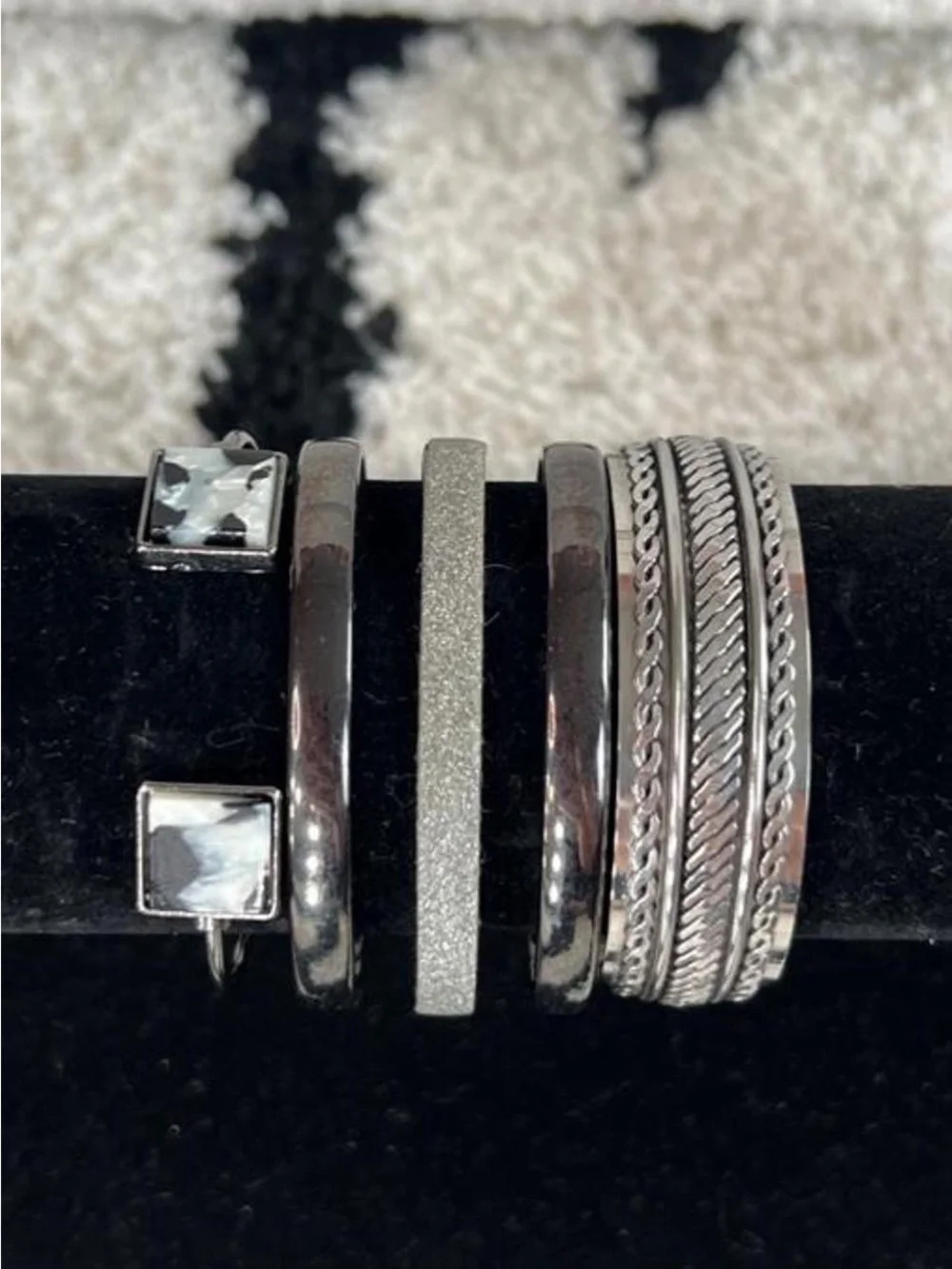 Silver and gunmetal tone set of 3 cuff bracelets